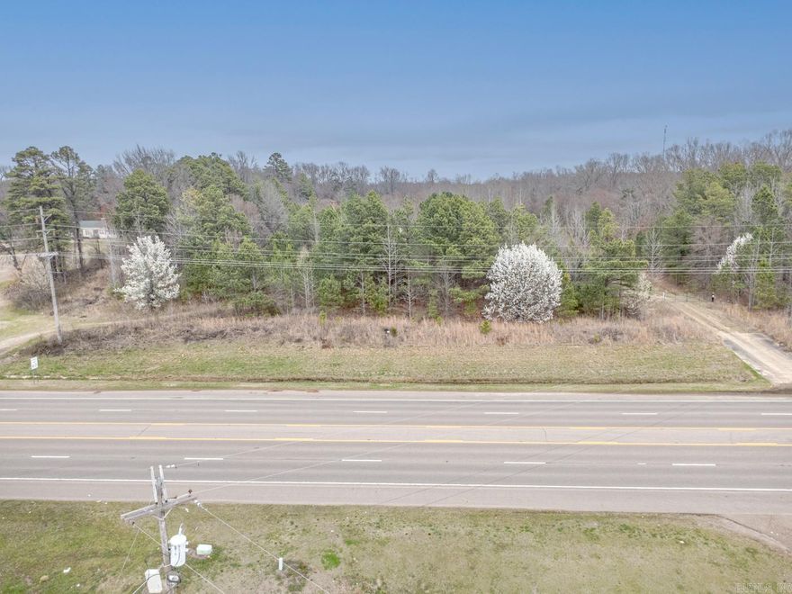 Welcome to Market 5.61 +/- acres of timberland on Hwy 1B in Forrest City, Arkansas. Excellent C-2 frontage and visibility opportunity along a major corridor connecting I-40 and downtown Forrest City. This prime piece of property is ready for development with 300 +/- linear feet of paved road frontage and estimated daily traffic counts of 11k+, and city utilities available nearby. Conveniently located near favorite local amenities, major transportation routes and just 45 miles from Memphis, TN and 90 miles to Little Rock, AR. Additional acreage available. Call today to schedule your private tour and make an investment in tomorrow by securing a versatile tract in one of Forrest City’s most visible growth corridors.
