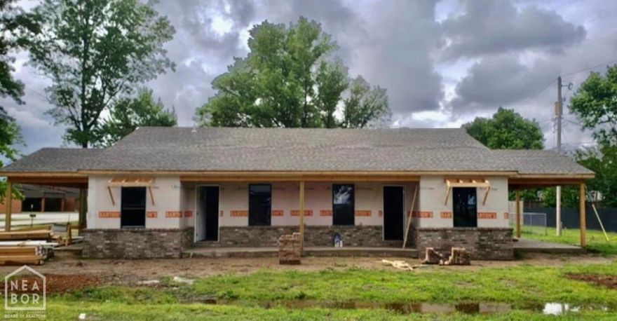 Income Producing Duplex. Should rent for $1350.00 Each with 3 bedrooms and 2 full baths. Across from Lawrence County School. Features include: Acid Stain Concrete floors, Board and Batten Siding combo with Brick base. Butcher block counter tops. All new appliances including microwave, stove, dishwasher, and refrigerator with manufacturer warranties. HVAC 10 year manufacturer warranty. Spray foam insulation. Seller has to finish a few more things but says the buyer may chose their own paint color for the wood cabinets if they chose.