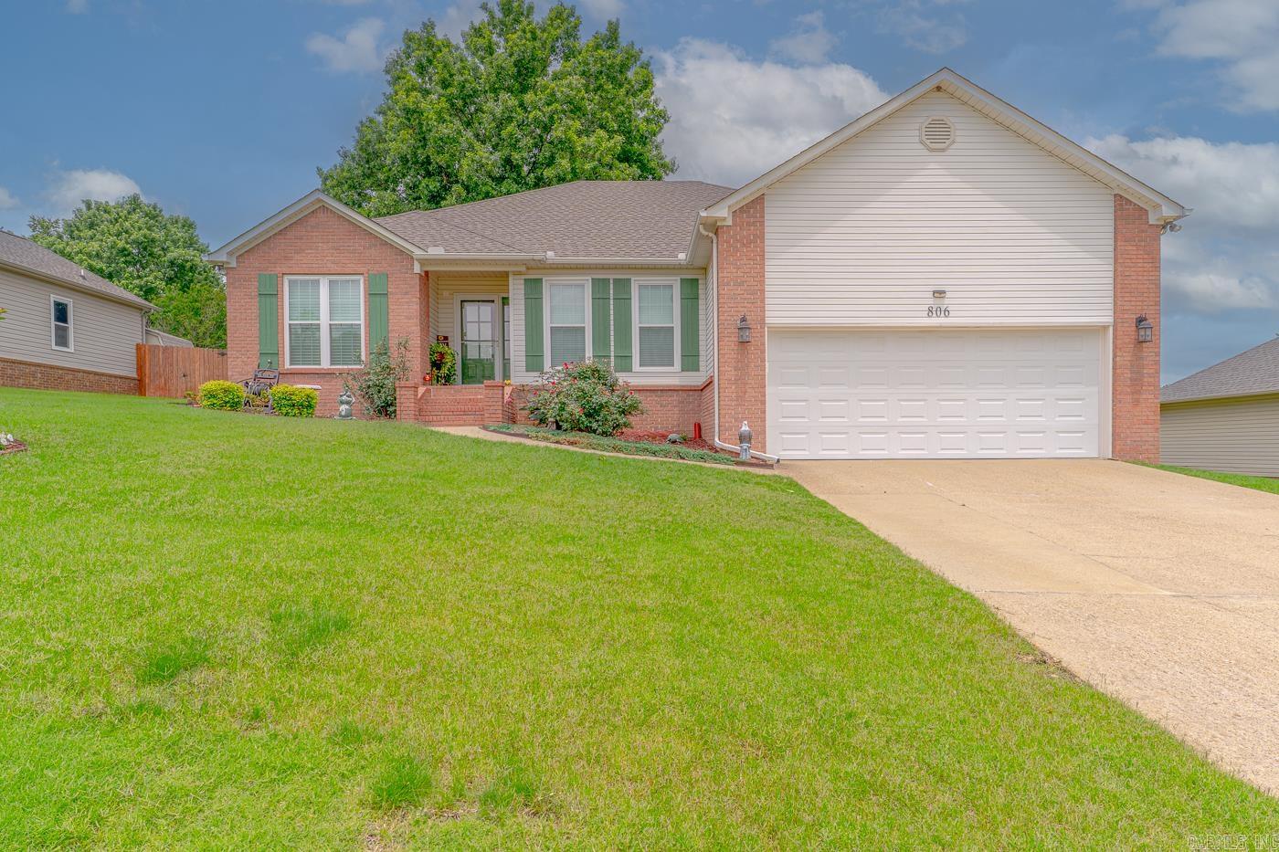 Welcome to Market 806 Amberwood Cove of the Lexington Estates Subdivision in Jonesboro, AR! This beautifully maintained 3-bedroom, 2-bathroom home offers the perfect blend of comfort, functionality, and modern features. Step inside and enjoy a bright and airy open-concept living and dining area filled with natural light from expansive windows, creating a warm and inviting space. The heart of the home is a spacious kitchen with granite countertops, a breakfast bar, and a pantry with pull-out shelvesāideal for cooking, gathering, and everyday convenience. Enjoy peace of mind with a new roof, new windows with transferrable warranty, new HVAC and a new water heater, all designed to offer worry-free living. The primary bedroom includes separate closets, providing plenty of storage space. The primary bathroom features elegant granite countertops with dual sinks, walk in shower, and soaking bathtub. Both guest bedrooms are spacious and have large closets with built ins. Step outside to a covered patio, perfect for relaxing and entertaining. Take advantage of the large storage building in the backyard for all your tools and extras. Call today to set up your tour of this gorgeous property!!