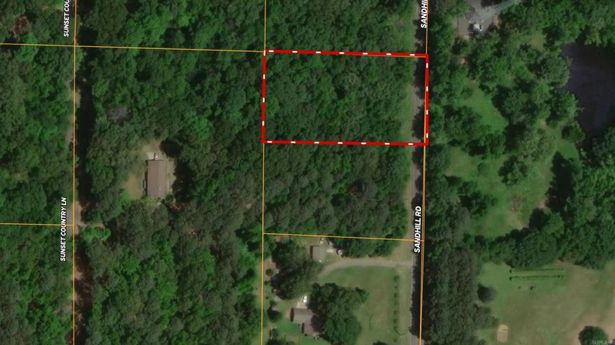Great 1.25 acre lot on Sandhill Road for building that dream home.  Property has been perked for septic system.  Water and electric at the road.  Approximately 165 feet of highway frontage x 330 ft deep.   There are very few good lots in this area for building.  Hurry.  It will not last long.    Another lot is available next to it making 2.5 acres in total if you want more room.