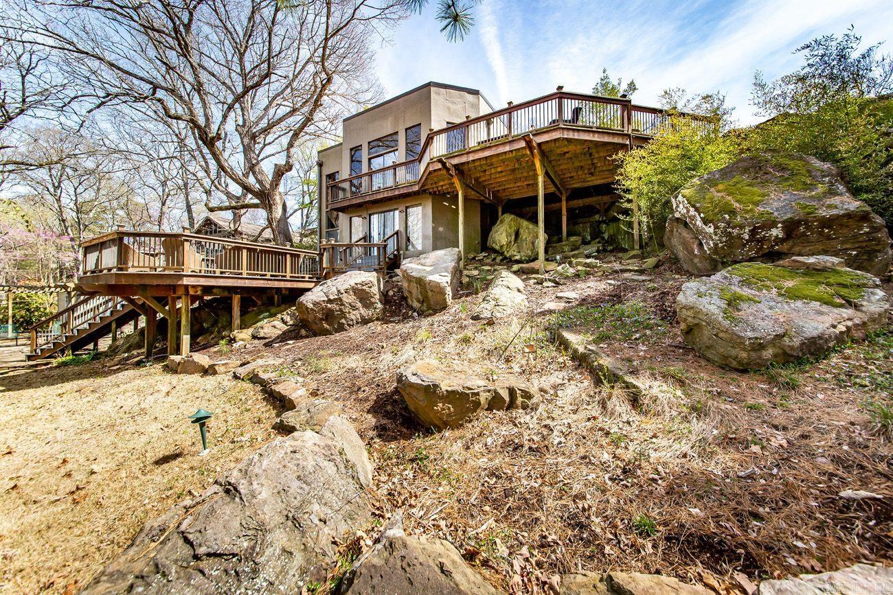 Picture yourself living in this fabulous home sitting on the Red Apple Golf Course in the world famous Eden Isle! This 5 bedroom, 5 bath contemporary home offers inspiring spaces and an exceptional amount of outdoor space for entertaining. Immaculately kept, custom built to perfection into a natural rock ledge! Schedule a viewing now: this one of a kind home is likely to sell fast!