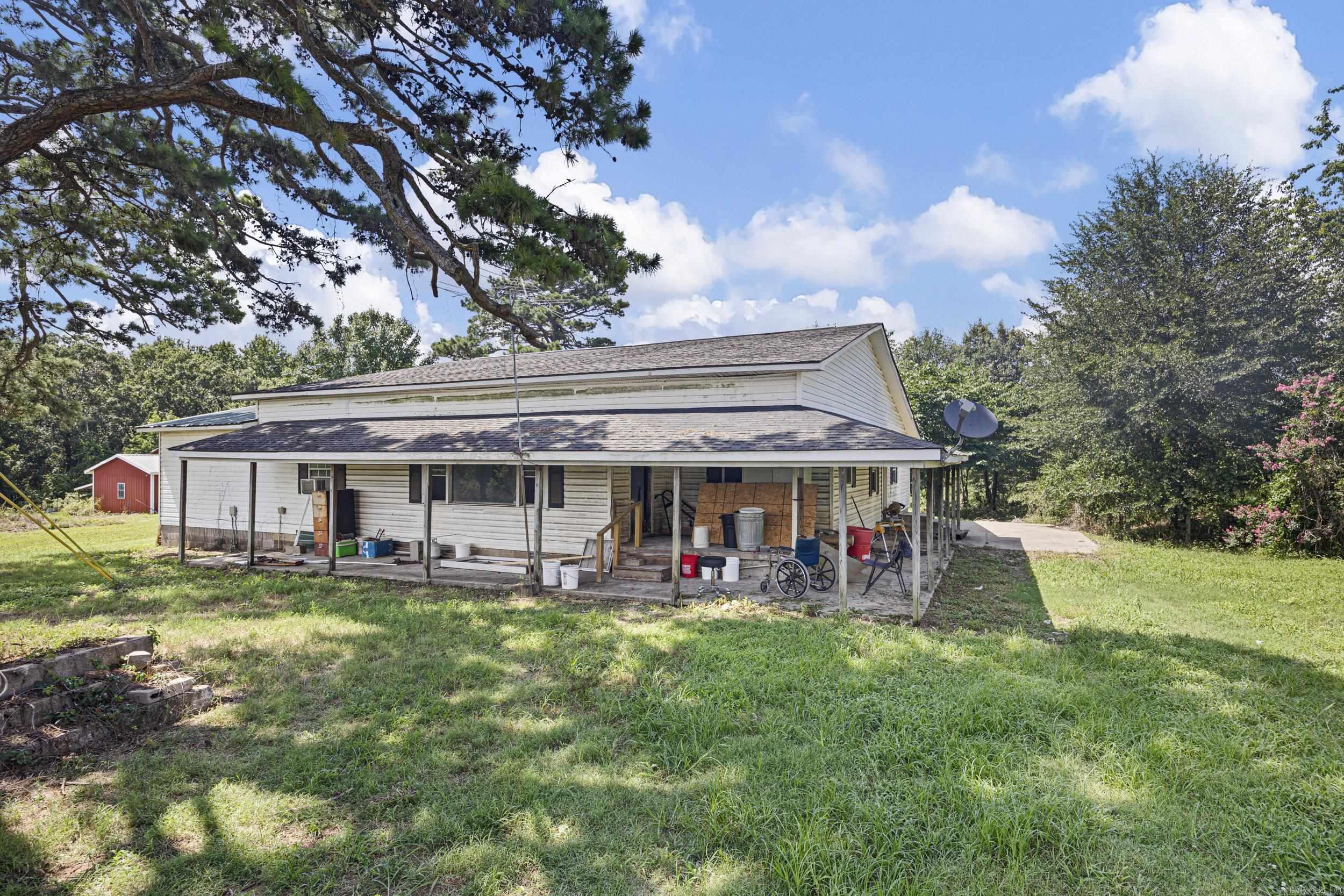 Spacious 5 bedroom, 2 bath farmhouse sitting on 10 beautiful acres in Dover! This 3,144 sq ft home (40x60 with 16’ lean-tos on both sides) offers tons of potential. Brand new Sheetrock and fresh paint throughout—just needs fixtures and your finishing touch to make it complete. Perfect setup for a hobby farm, rental, or forever home. Peaceful country setting with room to grow, all for just $280,000!