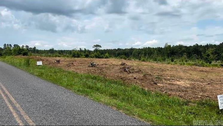 This beautiful 10-acre property offers the perfect opportunity to create your own dream country retreat. With a generous one-quarter mile of frontage on paved Central Road, this tract is easily accessible and full of potential. The terrain is gently rolling, providing an ideal setting for a variety of uses, whether you’re looking to build your dream home, start a farm, or enjoy the peace and privacy of rural living. Utilities are readily available along Central Road, making development a breeze. This is part of a larger 30-acre parcel, this 10-acre tract is being subdivided to offer a unique opportunity to own a slice of the countryside. Whether you’re seeking a peaceful getaway or space for your next project, this property provides the canvas to make your vision a reality. Don’t miss out on this incredible chance to own a piece of beautiful Arkansas land!
