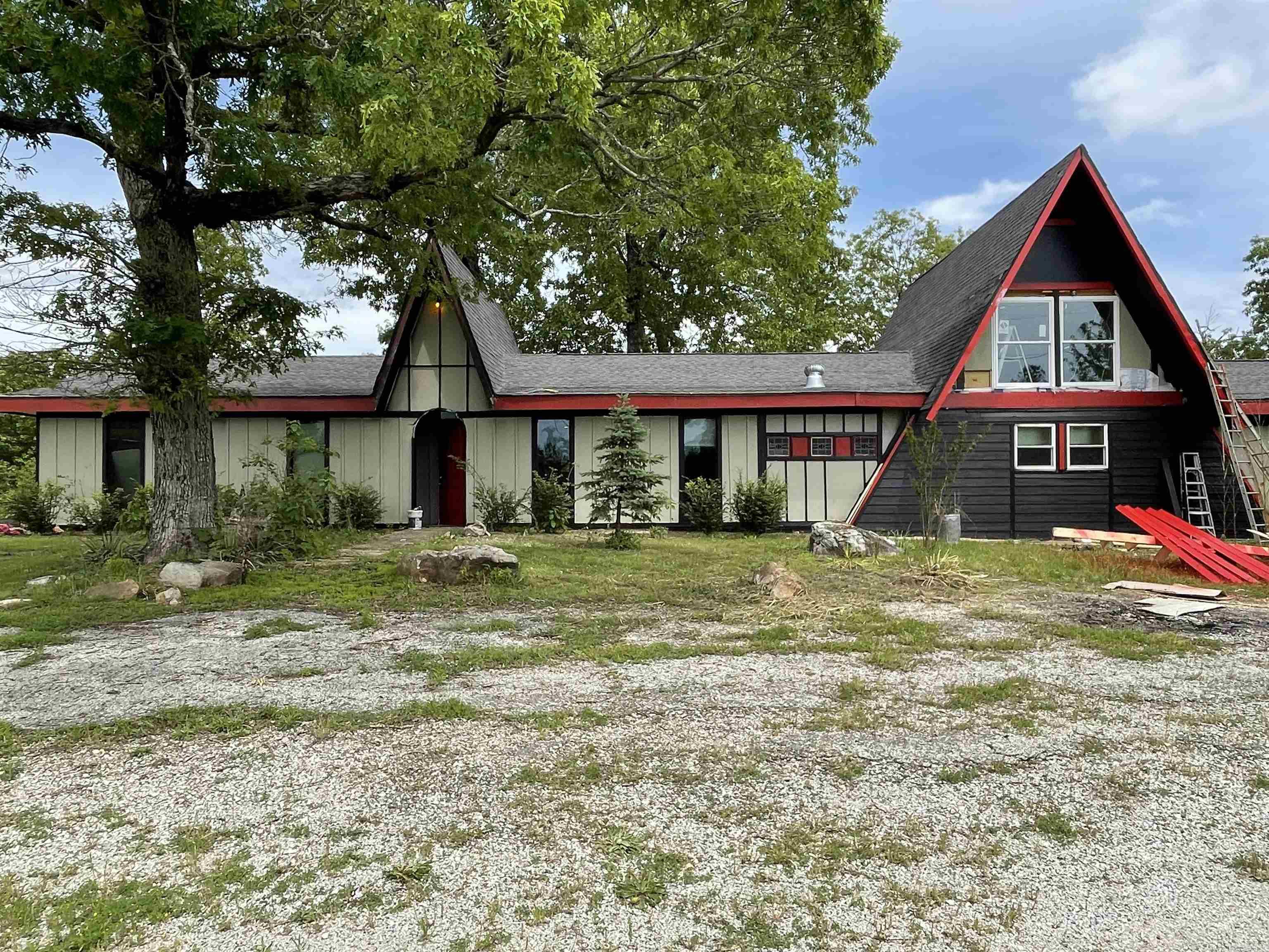 Prime commercial opportunity on Highway 5 South! This highly visible 1.34-acre (m/l) property is ideally located just minutes from Lake Norfork Dam and close to both the White and Norfork Rivers—perfect for attracting local and tourist traffic. With flexible zoning potential, it's well-suited for a small retail storefront, multifamily development, or a range of other commercial uses. Included is a spacious 3,000+ sq ft owner’s residence, offering the convenience of living on-site or converting into office or rental space. Priced at just $225,000.