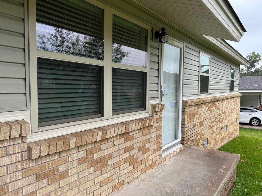 So cute and great price!! New roof, new siding, new vinyl windows 2023, newer HVAC system and water heater. Nice bathroom, great hardwood floors (needs to be refinished). Fenced in yard. If you update the kitchen, refinish floors, do some cleaning and painting, this place could look new! So much to offer, just need to put in a little work. Selling as-is, Conventional or cash only, range and disposal do not work.