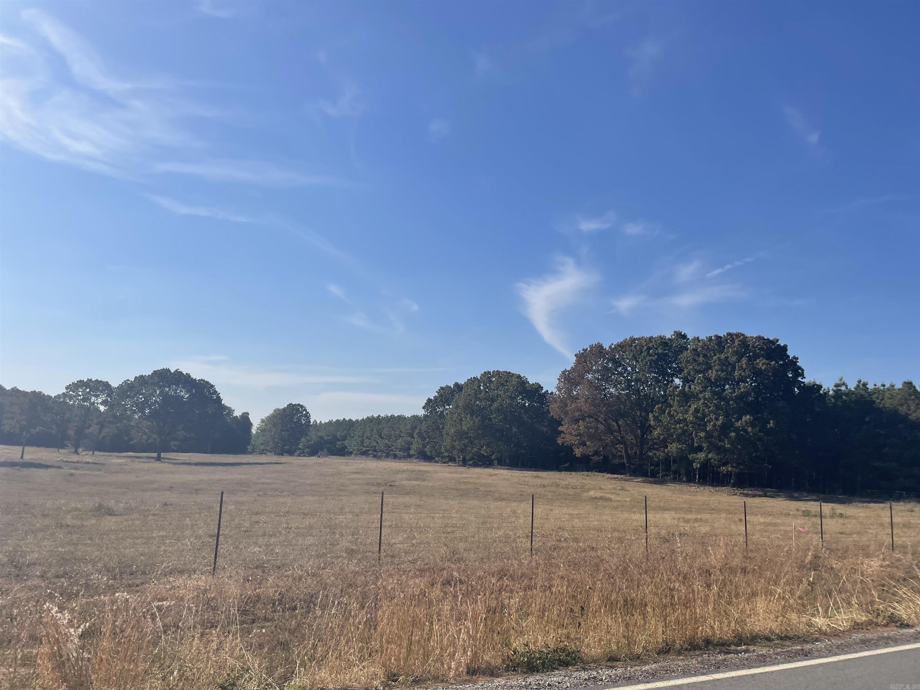 This peaceful 3 acre lot is perfect to build your dream home with plenty of privacy and frontage on Grandview road. Water and electric at road. No mobiles/1300 sq foot min. More photos to come soon.