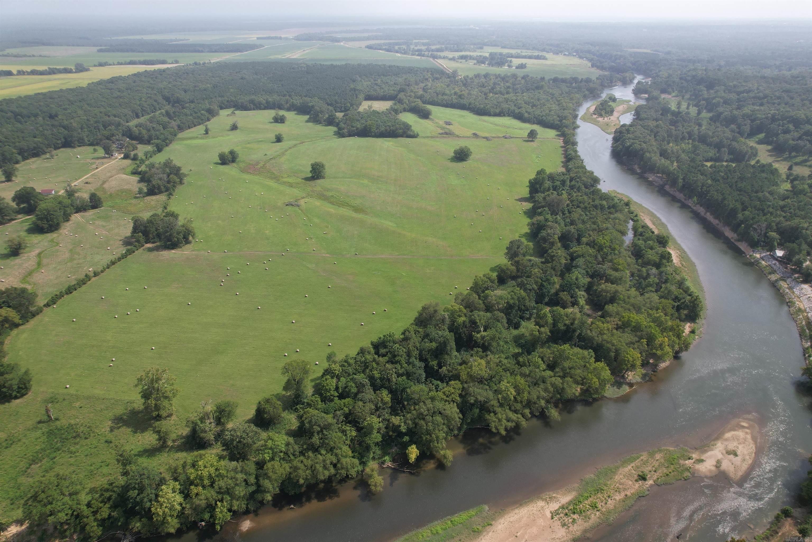 Never in your life will there be another opportunity like this to own over 2 miles of Ouachita River frontage*one of the few properties left that is undeveloped along the Ouachita River*only two families have ever owned this farm and it's rich in Arkansas history*breathtaking views*valuable resources for this unique and private farm include room for up to 20 three acre lots with river frontage for development*adjoining Caddo River frontage lots are selling between $200K and $300K*estimated $1,000,000.00 in river rock*plenty of valuable topsoil*less than one mile to Interstate 30*current survey*several outbuilding and skeet shooting field*great tax shelter opportunity*under MLS docs is a property information sheet and survey.