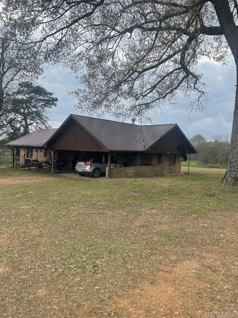 If you are looking for a place with a shop and lots and lots of storage, this is your place! Great potential for your own business The brick home consist of 3 beds, 2 full baths. Seller is motivated!