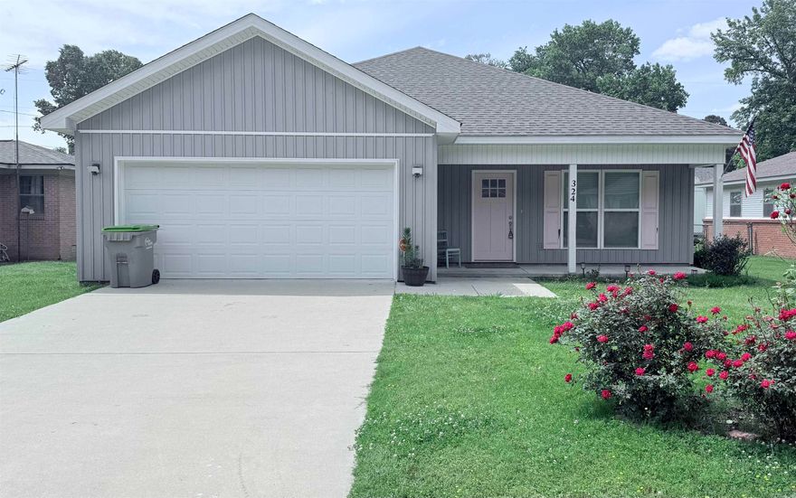 Discover this welcoming 3-bedroom, 2-bath home in the highly desirable Troutt subdivision of Benton. An open-concept design connects the living, dining, and kitchen areas, creating a bright, comfortable space perfect for everyday living and effortless entertaining. The eat-in kitchen features stainless steel appliances, a breakfast bar, and generous cabinet storage. The primary suite offers a private bath and a thoughtfully designed closet with built-in organization. Two additional bedrooms provide great flexibility for guests, family, or a dedicated home office. A separate laundry room and an attached 2-car garage add convenience and functionality. Enjoy outdoor living on both the covered front porch and the covered back patio—ideal spots for morning coffee or evening relaxation. The fully fenced backyard offering plenty of room to play. Move-in ready and situated in a prime location, this home delivers comfort, convenience, and a layout that fits a variety of lifestyles.