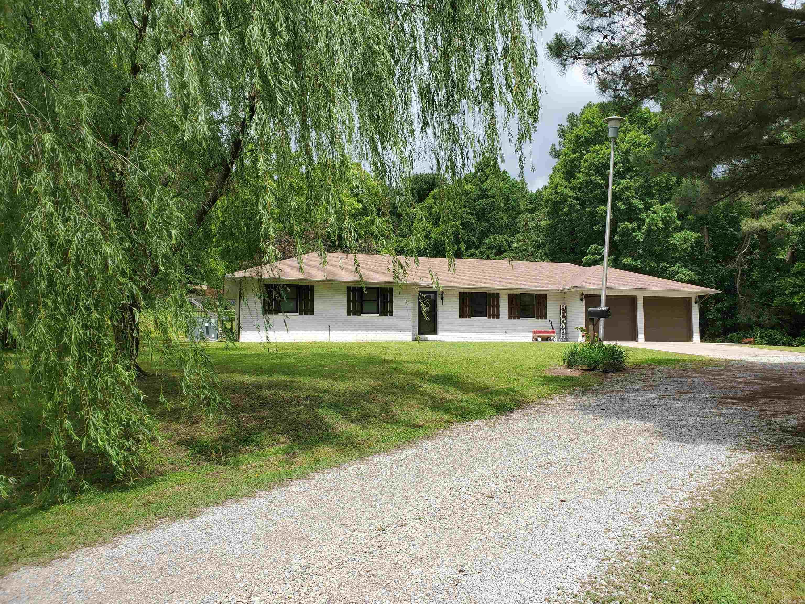 800 Hilltop Dr in Piggott, AR. is a 1.02 acre, 3BR, 2.5BA brick home nestled on top a quite 1.02-acre parcel! The amazing property offers a fully fenced in back yard, with a screened in back porch. A open floor plan allows for a smooth flow of traffic through-out the living space to dining area and kitchen! 3 large bedrooms, 2.5 baths and a 2 car garage make this property a must have!!