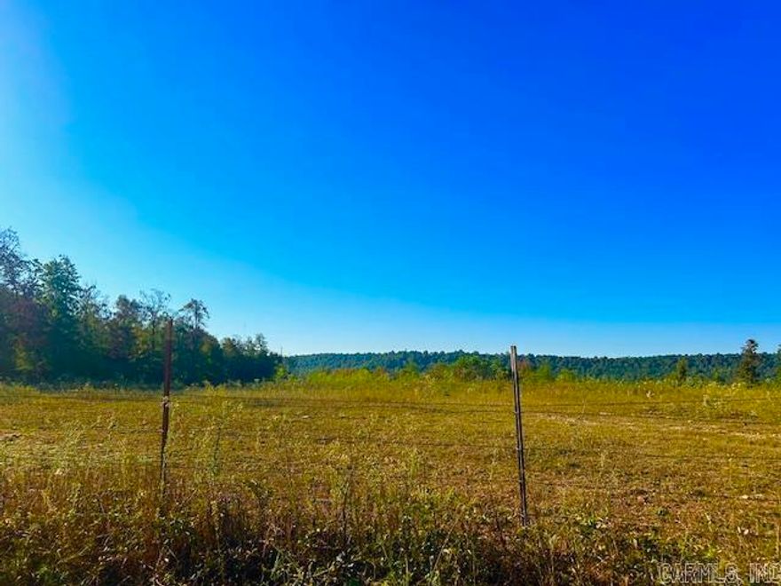 Discover this beautiful 57 acres of prime farmland with stunning mountain views-=perfect for your dream home, homestead, or hunting retreat. The property features pastureland, a pond for livestock, and no restrictions, giving you endless possibilities. Water and electricity are already in place. Located in Fox, just minutes from local stores and about 25 minutes to Mountain View for shopping, music, and festivals. The White, Buffalo and Red Rivers are all nearby for outdoor recreation. Call to see this property for yourself.