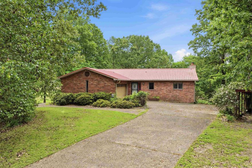 Golf course living in beautiful Hot Springs, Arkansas! This 4BR, 3 bath, 2-story home on 2 lots is perfectly positioned on a PGA-sanctioned golf course, offering stunning views & an unbeatable lifestyle.  Step inside to discover a spacious & functional floor plan designed for a variety of living options. Main floor has 2 BR/ 2 BA w a sunroom & deck, both with views of the golf course. Also on the main level is a livingroom/dining/kitchen open to each other. Downstairs are 2 addl bedrooms, a bathroom, & a game room. This home generously provides flexibility for everyone & space for a home office.  Enjoy nice mornings overlooking the fairway & relaxing evenings w golf course sunsets right from your back yard. Whether you're an avid golfer or simply love green space, this location delivers both privacy & scenic beauty.  Residents also enjoy an opportunity for access to outstanding community amenities including a clubhouse, swimming pool, pickleball courts, basketball court, picnic pavilion, & play ground. (for details on fees etc. visit www.diamondheadcommunity.com) Located in area known for lakes, outdoor activities & vibrant living this is the perfect balance of resort vs comfort.