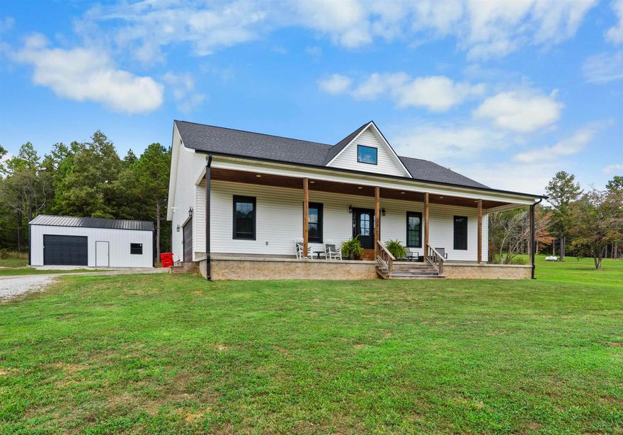 CUSTOM HOME on 3.26 acres! This farmhouse style home features an awesome floor plan with 9ft ceilings throughout and no wasted space! As you walk into the home you will see a gas fireplace in the living area, large kitchen/dining area with custom cabinets and granite countertops, built in pantry, stainless appliances, and island with additional seating. The master suite offers a walk in closet, full bathroom with large vanity, and a 6ftx4ft walk in tile shower! Both guest bedrooms are great size along with a mud room/laundry room with built in storage! There is an attached 2 vehicle garage with attic storage above and a 24x30 shop with a storage room & an office area! All of this located in a fantastic area close to the school & golf course!