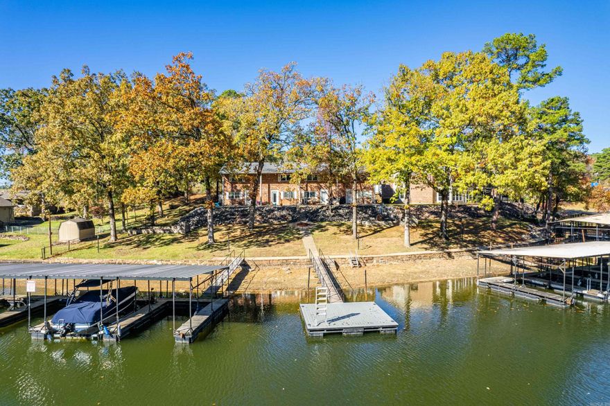 Updated 2-bedroom, 1.5-bath lakefront townhouse condo on Lake Hamilton in Hot Springs, Arkansas, seeking someone who enjoys sunsets, weekends on the water, and a covered boat slip that keeps things protected and drama-free. The main level keeps it easy: open living and dining space, functional kitchen, and a half bath for guests who “just stopped by.” Upstairs, two bedrooms offer some personal space when togetherness needs a break, plus a full bath that actually makes sense. Outside is where this place really shines. Lake views, quick dock access, and your covered boat slip ready whenever the mood strikes—boating, fishing, or floating with a beverage and no agenda. Low-maintenance, well-located, and minutes from Hot Springs dining, shopping, and Oaklawn. Great as a full-time relationship or a weekend fling. A place to be serious about that lake life and casual about everything else.