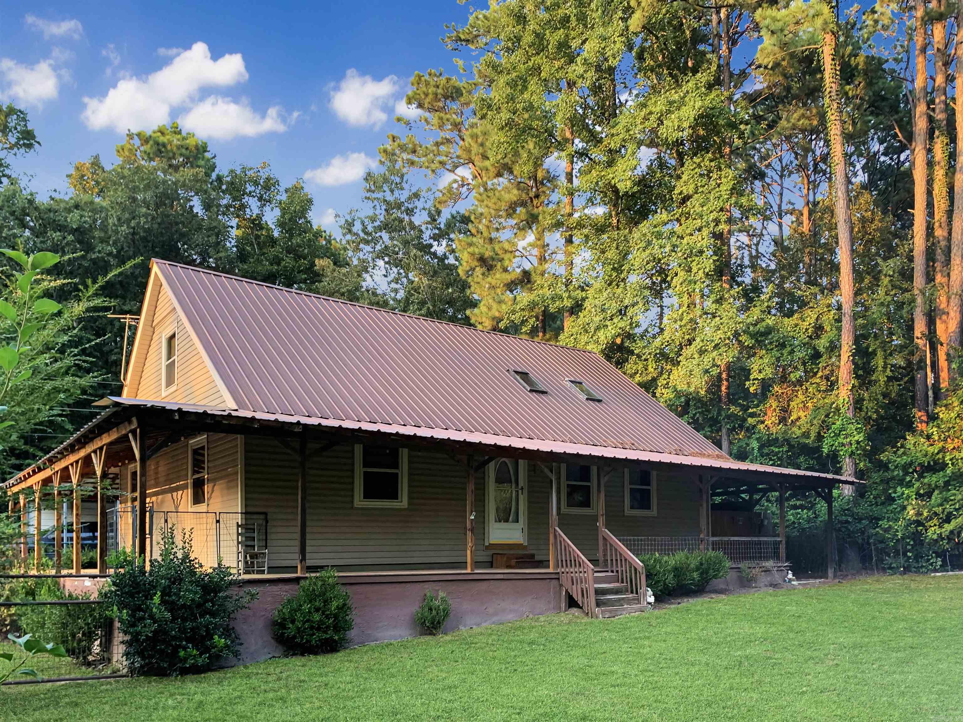 Are you looking to live out of the city? If so, take a look at this ranch style home located only minutes from Bismarck School District! This home has a beautiful wrap around porch so youāre able to enjoy what wildlife has to offer! The home has had updates such as new windows, siding, carpet, hvac, and the metal roof is 7 years old. Enjoy all new kitchen appliances and laundry appliances that will coney with the home! Donāt forget to check out the hot tub that will also convey! There are 2 workshops and a RV/Boat storage shop that all have electricity! This property is partially fenced and nestled on a little under an acre. Donāt miss out on this home!
