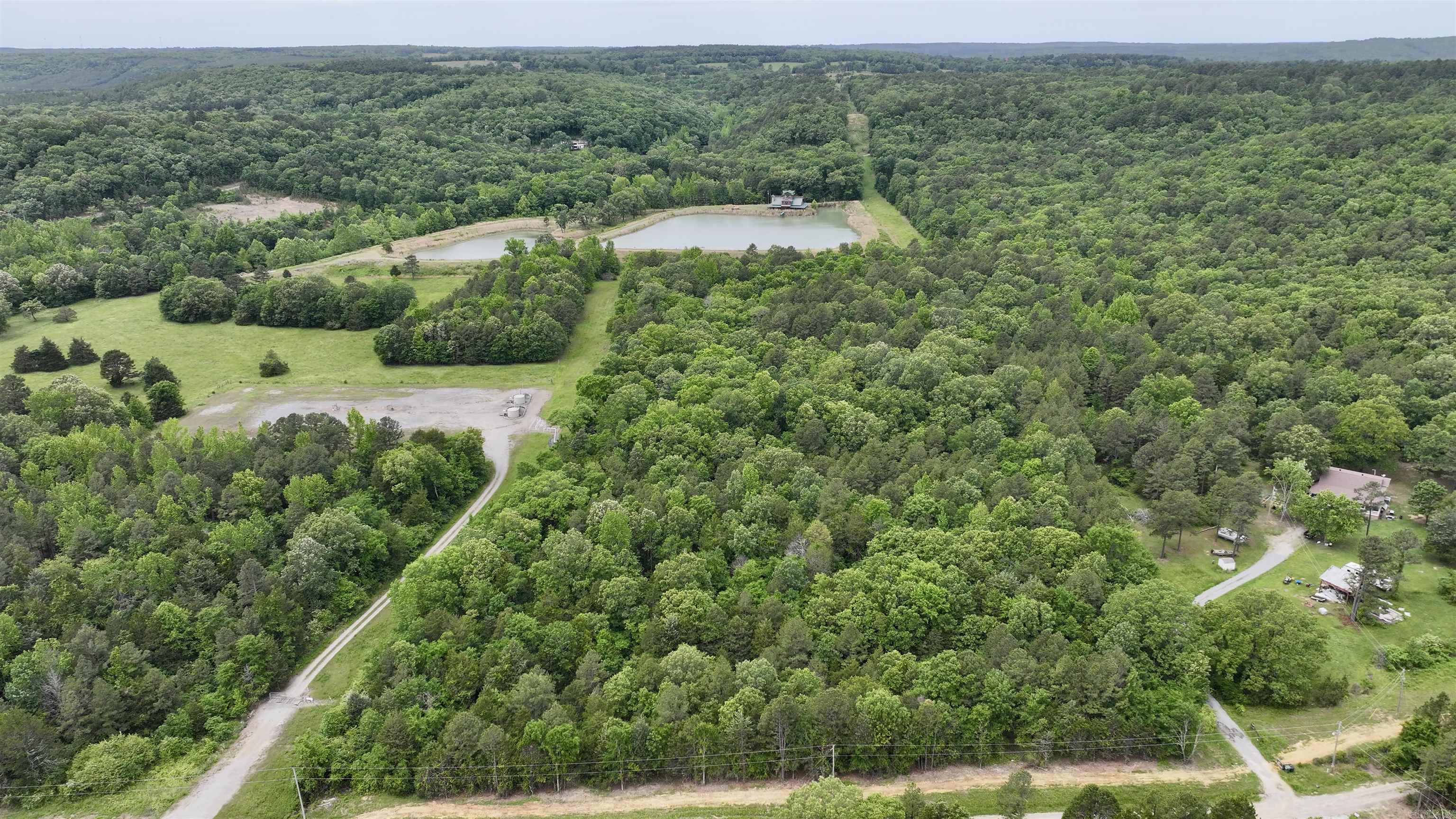 Beautiful rural property with beautiful trees and rolling hills. Great spots to build your dream home. Water is already on the property. Searcy schools.