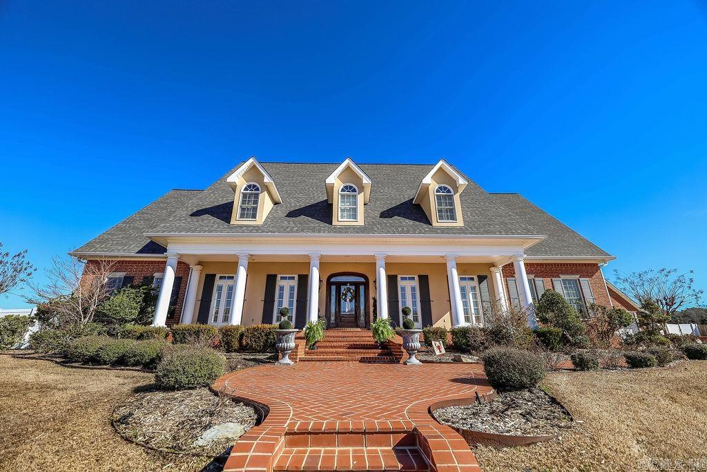 Discover the epitome of luxury living at this exceptional residence in the Timber Hills Subdivision complete with 4 ensuite bedrooms and over 6400 square feet. Step into a culinary haven with a spacious kitchen adorned with chef-style appliances, custom cabinets, and built-ins. The eat-in kitchen provides a cozy space for family meals, creating the heart of the home. The vaulted living room invites you to relax in style, while the adjacent formal living room and dining room offer an elegant setting for entertaining. The vaulted game room with a wet bar adds an extra layer of sophistication, providing the perfect space for gatherings and recreation. Outside, your private oasis awaits with a covered patio with woodburning fireplace, refreshing pool and a three-car garage for added convenience. The large shop with two camper-sized garage doors is an ideal space for those with diverse interests, offering room for tinkering and convenient storage for outdoor toys. Additional amenities include a safe room, craft/sewing room, and office/5th bedroom. Schedule a private tour now to see all this custom built home has to offer.