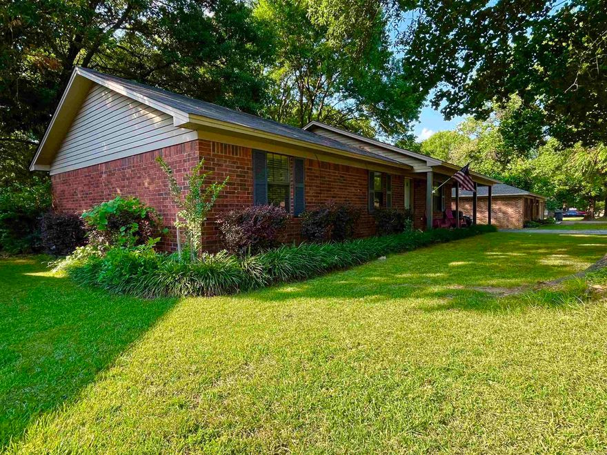 Charming 3 Bedroom 2 Bathroom home on the Westside of town! This home was remodeled beautifully in 2019 with exqusite granite countertops, luxury vinyl, tile, stanless steal appliances, faux wood blinds, gorgeous wooden barn door, new hot water heater, roof is 2019, HVAC is 2016, Large fenced in back yard that has Gin Creek in the back of it! The nice wooden play set/club house stays also! Two storage buildings and a dog pen. This one will not last!