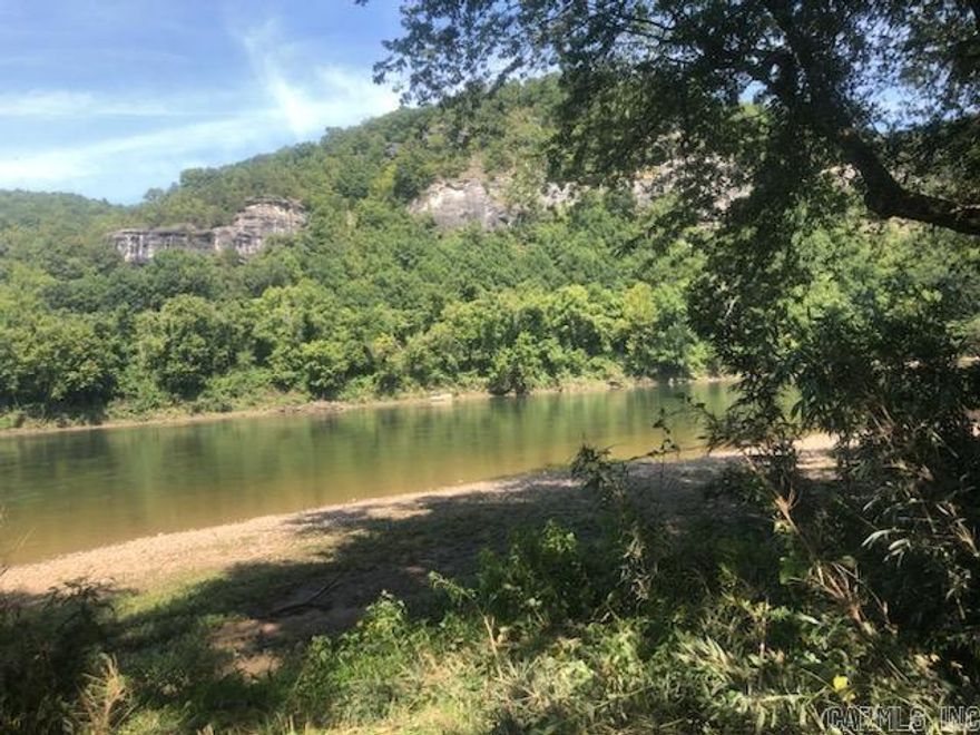 White River Frontage! If you are looking for more than just a lot on the famous White River, here is 7.62 acres. It was an old home place, pretty shade trees also offers a gazebo you can set and enjoy the view of the river and beautiful bluffs, old well, elect. rural water and fiber optic internet, and a very short distance to a boat launch. This one you have to see to appreciate the views and property.