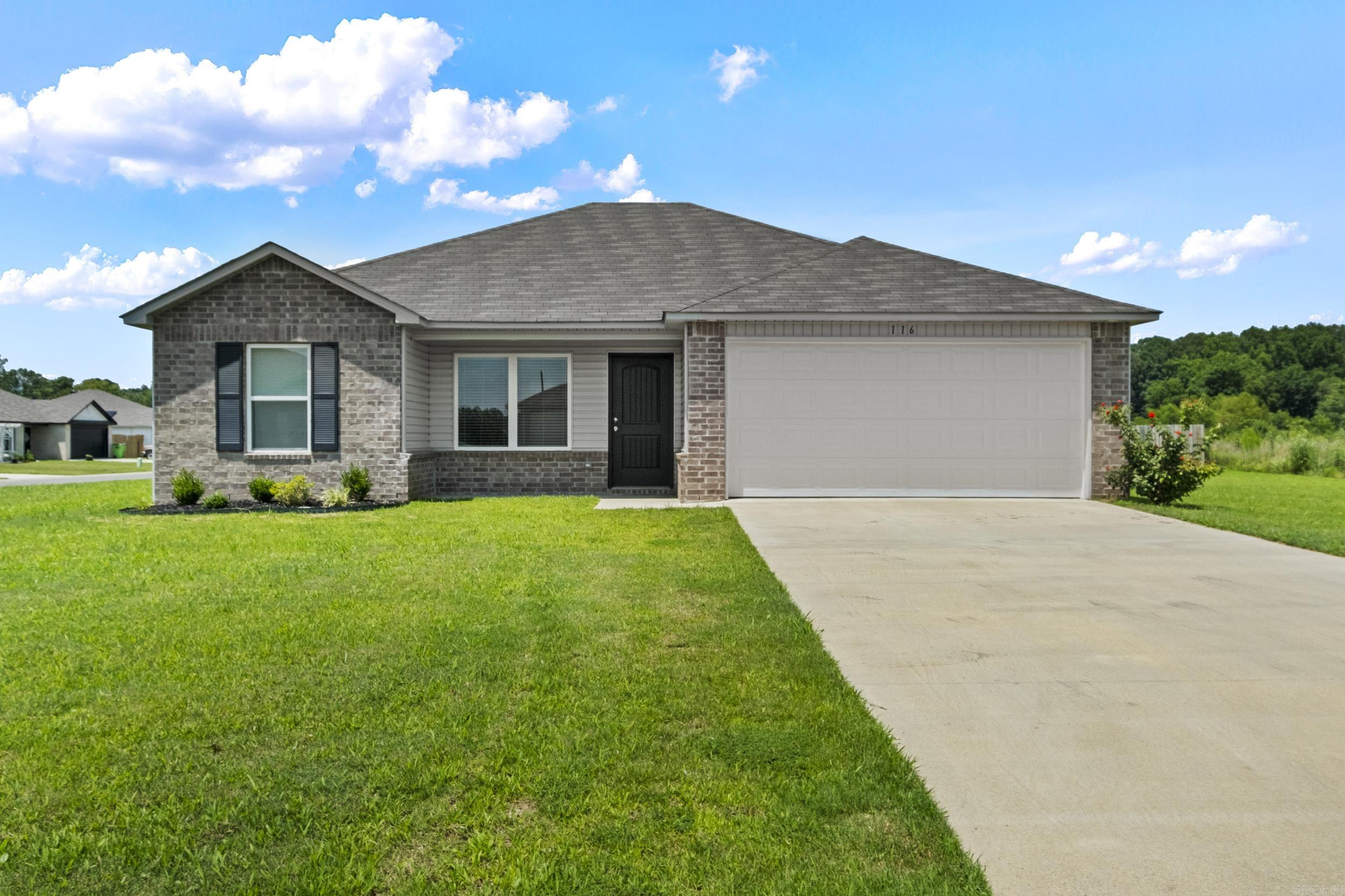 This one is truly better than new. Super clean and move in ready. The sellers have added 2" blinds throughout the entire home, ceiling fans, nice hardware on cabinet doors and Solar Panels. The Solar Panels will be free to the new owners giving them ultra low utility costs on this all electric home. The seller will pay off solar panels at closing. Stainless steel kitchen appliances with a pantry closet. It is a split bedroom plan with a seperate laundry room. Big garage with electric garage door opener. The house has only been lived in for about 1 year. 2 non smoking adults with no children or pets. It is super clean, Looks brand new. Private lot location with very little traffic.
