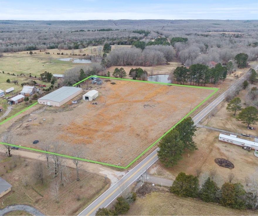 Rare opportunity for a new or established business or homestead. This property consists of 4 metal buildings on 8 acres. The main building is 75' x 150' and has 2 14' rolling doors. There is office/living and a bathroom. The second building also has 2 14' rolling doors. Property is being sold as is.