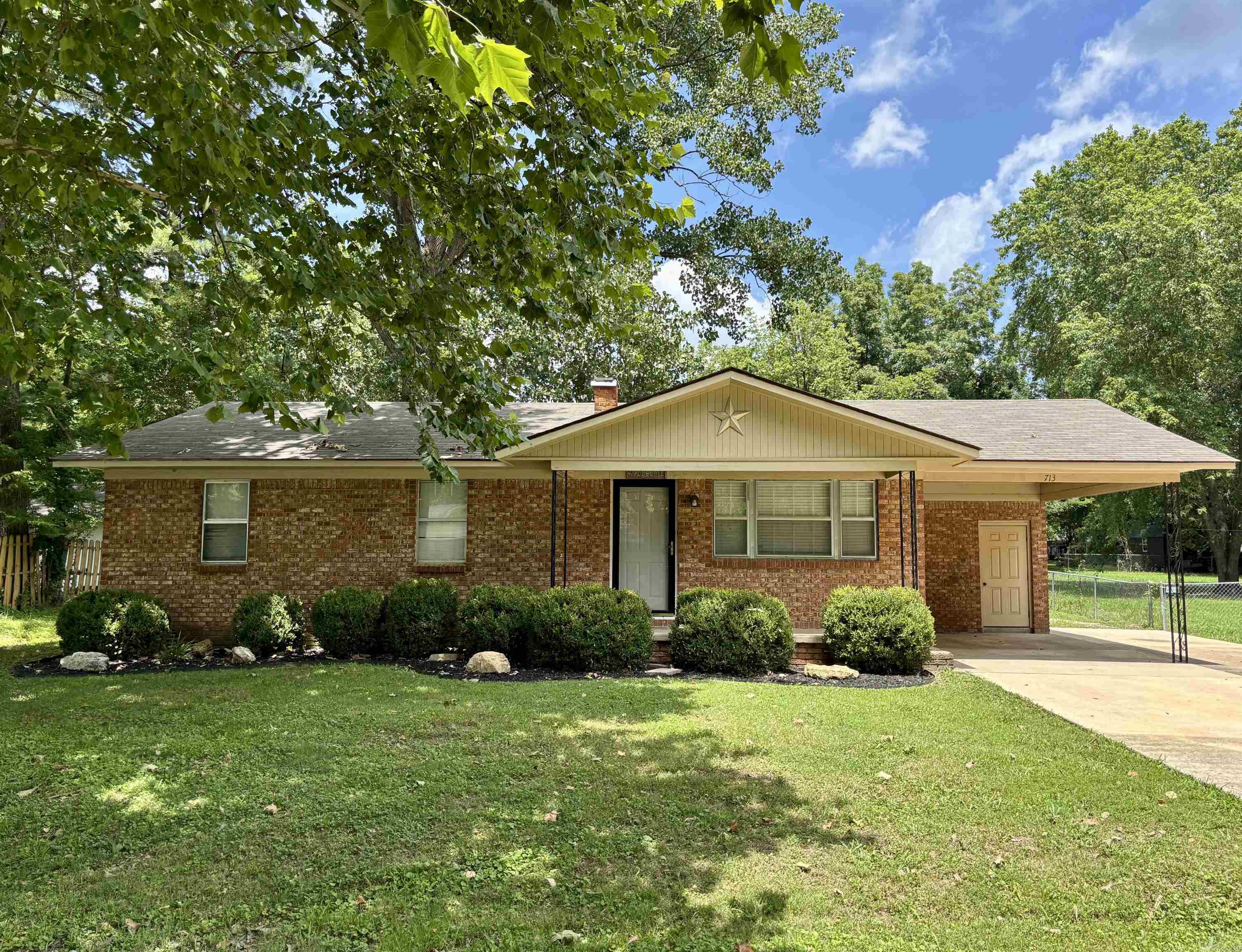 Well-kept 3-bedroom, 1-bath home packed with recent upgrades and extras! The roof and exterior A/C unit were replaced in 2022, and in 2025 the water heater, sub-flooring, and flooring were updated in the living room, kitchen, laundry room, bathroom, hallway, and 1st bedroom—offering long-term peace of mind. The home comes fully equipped with a washer, dryer, and refrigerator, making it truly move-in ready. Outside, you'll find a covered carport, a small storage shed, and a spacious 30x30 shop—perfect for hobbies, storage, or a home workspace. This home is a short walk to Sloan Hendrix School and blends comfort, functionality, and value in one neat package—don’t miss your chance!