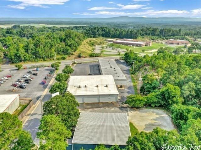 Unique opportunity to own a highly visible strip center in one of Hot Springs fastest growing corridors with high traffic counts amongst national retailers. This property has 17,985 sq ft under roof with 9 individually metered units on 1.94 acres. ADDITIONAL PICTURES