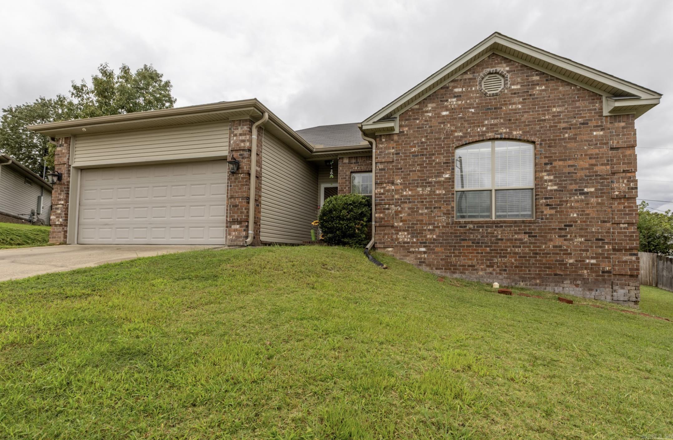 Discover the charm of 1909 Windridge Court! This 3-bedroom, 2-bath home sits on a peaceful cul-de-sac and offers a fireplace-centered living room, a spacious primary suite with walk-in closet, and a convenient two-car garage. With 1,387 sq ft, this home is the perfect mix of cozy and functional — all in a great Sherwood location close to shopping, dining, and schools.