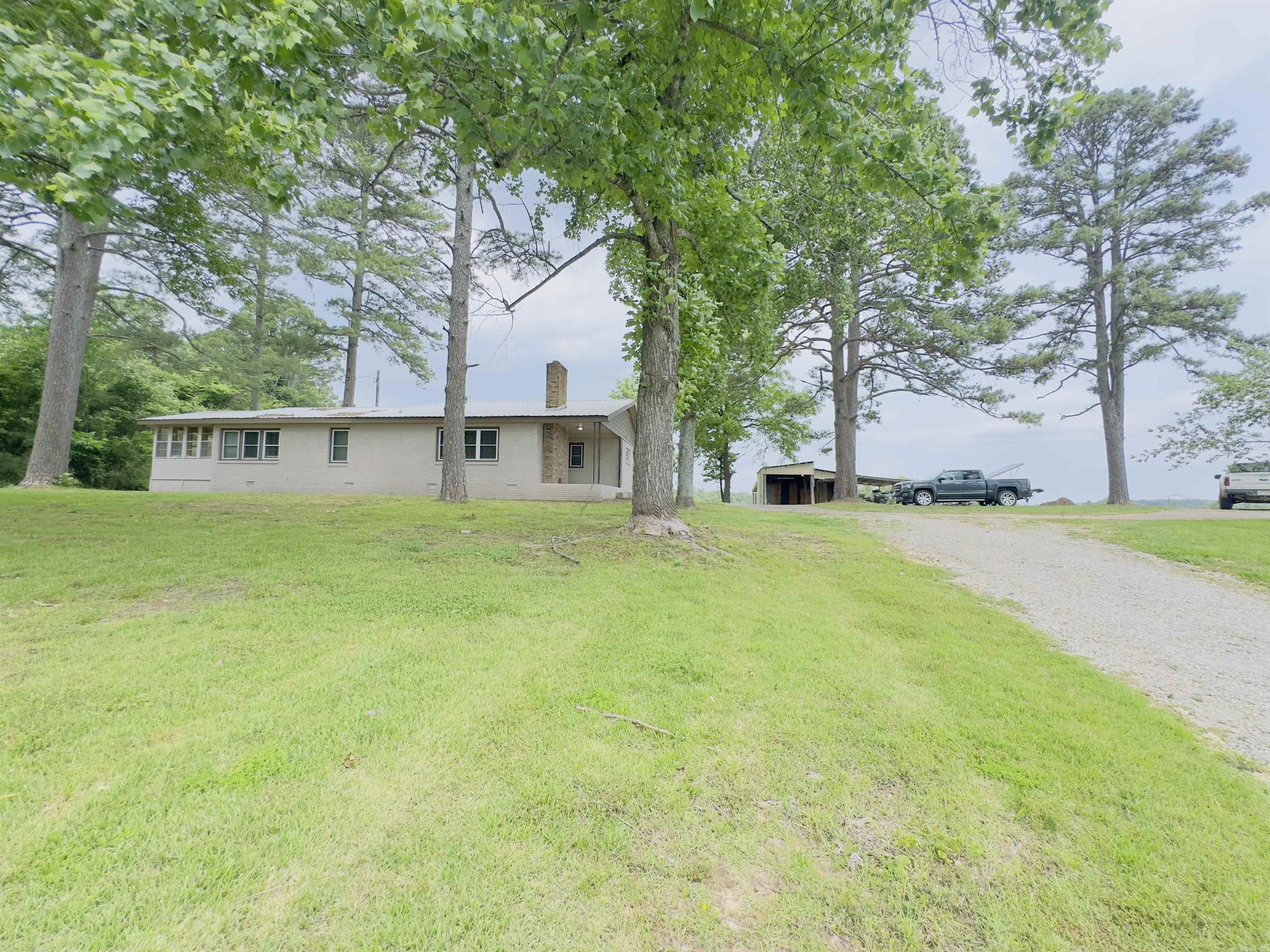 Donāt miss this great country property located just off Hwy 56 in Wideman, Arkansas! This 2-bedroom, 2-bathroom home sits on 4.5 beautiful acres with views of Pilot Knob Mountain right out your front window. With 1,292 sq. ft. of living space, this home offers comfort and updates, including a new hot water heater and new central heat and air unit. The cozy living area features gas log fireplace for extra warmth. The home also includes a large utility room, a sunroom for relaxing, and all appliances will stay, making this move-in ready. Outside, youāll find a shop building with a lean-to to store outdoor equipment and tools, along with a small pond that holds water seasonally. The property is filled with mature shade trees, providing a peaceful setting for outdoor living. Plus, enjoy high-speed internet availabilityāa rare find in the country! Whether you're looking for a full-time residence or a weekend getaway in the Ozarks, this property offers the perfect mix of comfort, land, and locationāall listed for only $179,900!