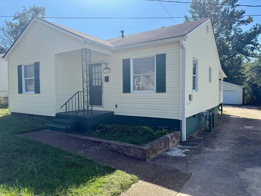 Welcome to 1220 Thelma Street in Benton, AR! This charming house offers a cozy and comfortable living space with 2 bedrooms and 1 bathroom. The open floor plan creates a warm and inviting atmosphere, perfect for relaxing or entertaining guests. The house features a spacious back deck, providing a great outdoor space for enjoying the beautiful surroundings. With no carpet throughout, cleaning and maintenance are a breeze. The location of this house is truly unbeatable, offering convenience and accessibility to all that Benton has to offer. Additionally, the property includes a large garage/shop, providing ample storage space for all your needs. Don't miss out on this wonderful opportunity to make 1220 Thelma Street your new home!