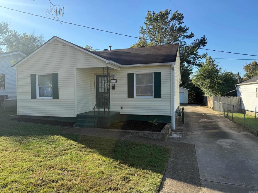 Welcome to 1220 Thelma Street in Benton, AR! This charming house offers a cozy and comfortable living space with 2 bedrooms and 1 bathroom. The open floor plan creates a warm and inviting atmosphere, perfect for relaxing or entertaining guests. The house features a spacious back deck, providing a great outdoor space for enjoying the beautiful surroundings. With no carpet throughout, cleaning and maintenance are a breeze. The location of this house is truly unbeatable, offering convenience and accessibility to all that Benton has to offer. Additionally, the property includes a large garage/shop, providing ample storage space for all your needs. Don't miss out on this wonderful opportunity to make 1220 Thelma Street your new home!