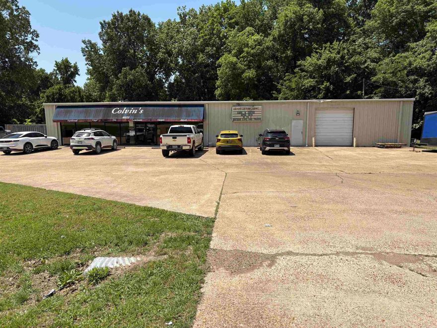 Welcome to the Market. Opportunity Knocks but are you going to Answer? Up for sale is a approx 9000 square feet commercial build that is 1 mile from interstate 40 and is Hwy frontage. This property features a showroom, a warehouse/shop, a full custom kitchen, custom shower, offices, and plenty of storage. Colvin's isn't for sale just the building  Also included in the sale is the 480 square feet building that is currently a coffee shop,  It can include everything to continue as coffee shop and business is available for the right the right offer.   Both must be bought together unless just interested in the Big building