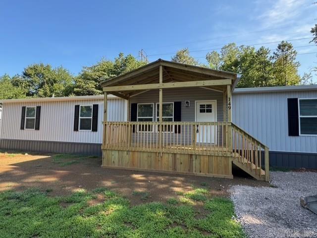 Brand new 4 bed 2 bath home on .39 acre, New manufactured home. on permanent foundation, covered front deck, back deck. MOVE IN READY. Just minutes from Lake and boat access. Several new homes being built on this street from seller. All new homes. Entergy smart homes with new features. close to town and all shopping, restaurants and activities Hot Springs has to offer. Home Warranty from the builder is included. Seller has several Lenders ready to assist you with a home loan if needed. qualifies for RD loan also.