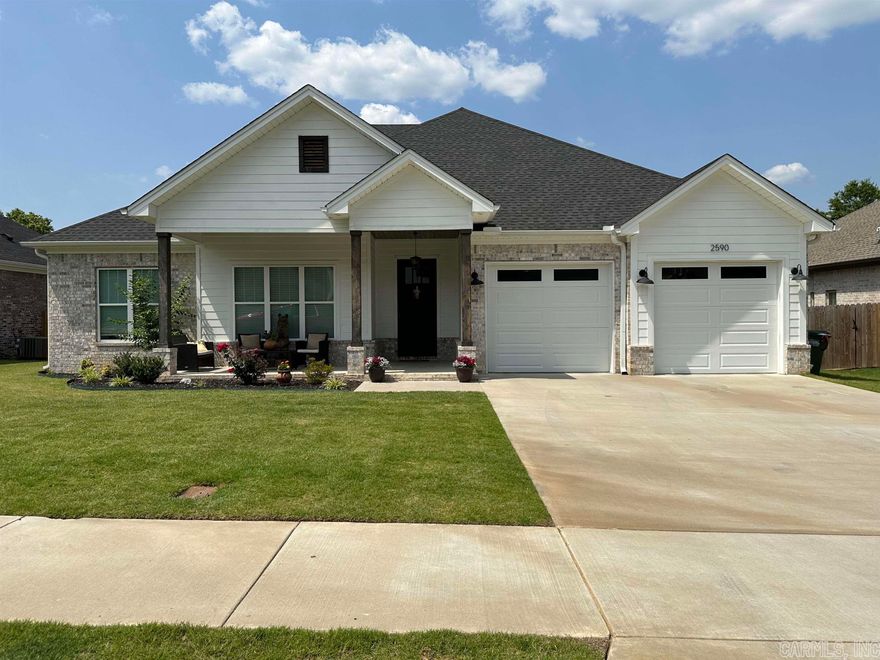 JUST LIKE BRAND NEW!  Immaculate home with a gorgeous open floor plan with custom white cabinets with some having glass fronts, gas range, granite counters with a very functional island with seating area.  Spread your wings, entertain all you want in this great living room with gas log fireplace which opens into a separate office/flex room as well as the covered porch as well as the extended patio.  The dining area can easily entertain all your guests.  The split bedroom plan featuring the master bedroom with an en suite with deluxe tub as well as a walk in shower.  Also, your dream has come true with this walk in closet! Home is complete with luxury vinyl flooring throughout the home except in the two extra bedrooms. Come home to your new home, you will THANK ME later!