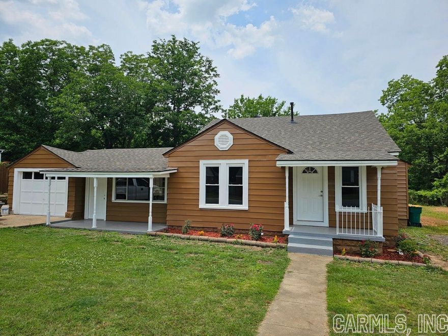 Beautiful remodeled house in the heart of Russellville with 4 bedrooms and 2 full bathrooms. Close to the hospital, clinics, shopping, entertainment and Lake Dardanelle. New paint inside and outside. New HVAC combo 05/23, new roof 2023, new Kitchen cabinets and appliances. New light fixtures and ceiling fans. New toilets, vanities and remodeled walk in shower. Beautiful original hardwood floors left to preserve the charm of the 40,s. Spacious backyard for all those gatherings with family and friends. Plenty of space to put a swimming pool to cool off this Summer. Schedule an appointment today and tour this charming house.