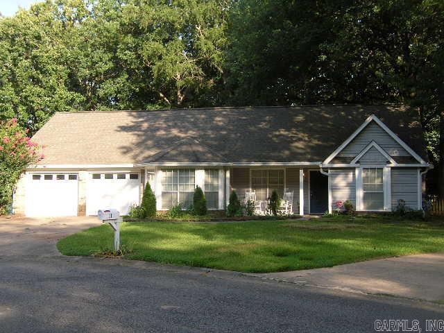 Charming Family Home for Sale Located in the Heart of Maumelle with access to 2 golf courses and paved walking trails. This charming family home is situated in a highly sought-after neighborhood. Nestled on a picturesque Cul de sac, this property boasts exceptional curb appeal and an inviting atmosphere that makes it an ideal choice for families. This Charming 3BR / 2BA/Bonus room/laundry room, features split master BR floorplan. Master BR is extra-large with a large walk-in closet with bathroom that includes a double vanity with sitting space/tile floors.2BR share a hall w/ 2 closets full size bath with new fixtures . Kitchen with bar/breakfast nook, bay windows with large Pantry. Great room and Bonus room boast Cathedral ceilings. Huge Great room showcases a gas starter fireplace that opens into a Sunroom that is enclosed and fenced in backyard with a paver walkway leading to the outdoor firepit for entertaining, Detached Building w/ lights/electricity for any hobby. New AC/Furnace 2022, NEW ROOF 2019, fresh paint throughout entire house with New tile in entryway/hall/ hardwood laminate floors. Double pane windows. HUGE Garage 550 sqft. with built in cabinets. See agent remarks!
