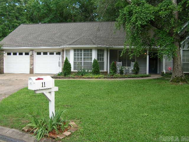 Charming Family Home for Sale Located in the Heart of Maumelle with access to 2 golf courses and paved walking trails. This charming family home is situated in a highly sought-after neighborhood. Nestled on a picturesque Cul de sac, this property boasts exceptional curb appeal and an inviting atmosphere that makes it an ideal choice for families. This Charming 3BR / 2BA/Bonus room/laundry room, features split master BR floorplan. Master BR is extra-large with a large walk-in closet with bathroom that includes a double vanity with sitting space/tile floors.2BR share a hall w/ 2 closets full size bath with new fixtures . Kitchen with bar/breakfast nook, bay windows with large Pantry. Great room and Bonus room boast Cathedral ceilings. Huge Great room showcases a gas starter fireplace that opens into a Sunroom that is enclosed and fenced in backyard with a paver walkway leading to the outdoor firepit for entertaining, Detached Building w/ lights/electricity for any hobby. New AC/Furnace 2022, NEW ROOF 2019, fresh paint throughout entire house with New tile in entryway/hall/ hardwood laminate floors. Double pane windows. HUGE Garage 550 sqft. with built in cabinets. See agent remarks!
