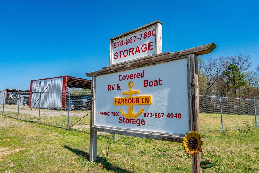 A versatile 60-acre property in the heart of Montgomery County at 3056 Hwy. 270 E in Mount Ida, Arkansas. This unique offering features a thriving 38-unit covered boat and RV storage business, providing immediate income potential with ample room for future expansion. Financials available on request.  The land itself is a true outdoor paradise, highlighted by a scenic 7+ acre stocked pond—perfect for fishing, relaxing, or enhancing the property’s recreational appeal. Abundant wildlife, including deer, and ducks makes this an excellent hunting retreat or a peaceful getaway for nature enthusiasts.  A large shop and additional storage buildings offer plenty of space for equipment, maintenance, or business operations, adding even more functionality to this already diverse property. With highway frontage and easy access, this location is ideal for continued commercial use, investment, or a combination of business and personal enjoyment. Subdivided lots around the pond would be easy with utiilities and road access from Shady Grove Rd.   The Property is a very short drive to Lake Ouachita, National Forest and less than 30 minutes to Hot Springs.