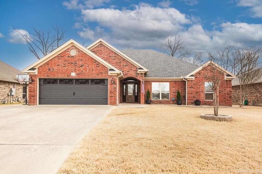 Spacious 4-Bedroom, 2-Bathroom Home with a Flex Room in Lakewood! This beautiful home has everything you need, starting with an inviting entryway that flows into the living room with hardwood floors and a cozy gas fireplace. The kitchen is a standout, featuring a breakfast bar, granite countertops, stained cabinets, a pot filler above the stove, a coffee bar, and a big pantry for all your storage needs. The primary suite is a dream with a tray ceiling, his-and-her closets, a jetted tub, and a double sink vanity. The flex room offers extra space for an office, playroom, or whatever fits your lifestyle. Step outside to enjoy the screened-in back porch, extra patio space, and a fully fenced backyardāperfect for relaxing or entertaining. Located in the desirable Lakewood Subdivision, this home is a must-see!