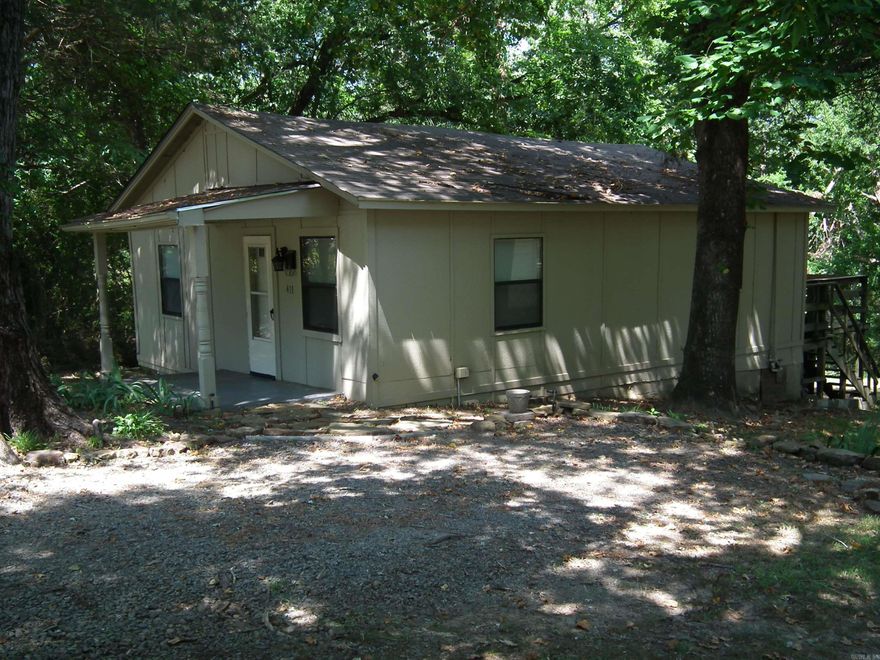 Very cute first home or maybe you're downsizing.  Great rental prospect. New in 2019: roof, carpet, 1000 gallon septic tank. Wiring replaced. Insulated windows. Central heat & air. Large, private back yard.  Large back deck.  Place in utility room for stackable washer/dryer. Sold AS IS