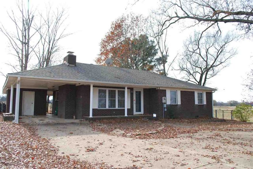 Roomy 2 bedroom 1 large bath on 2 acres in country setting; shop/storage building. Open living/dining/kitchen areas. Wood burning fireplace. Built-in desk. Large Walk-in closet; Covered front and back porches and back deck. New Roof and New Windows 2007; New Heat/Air unit 2008; Easy access to I-40 for commutes. See Remarks.