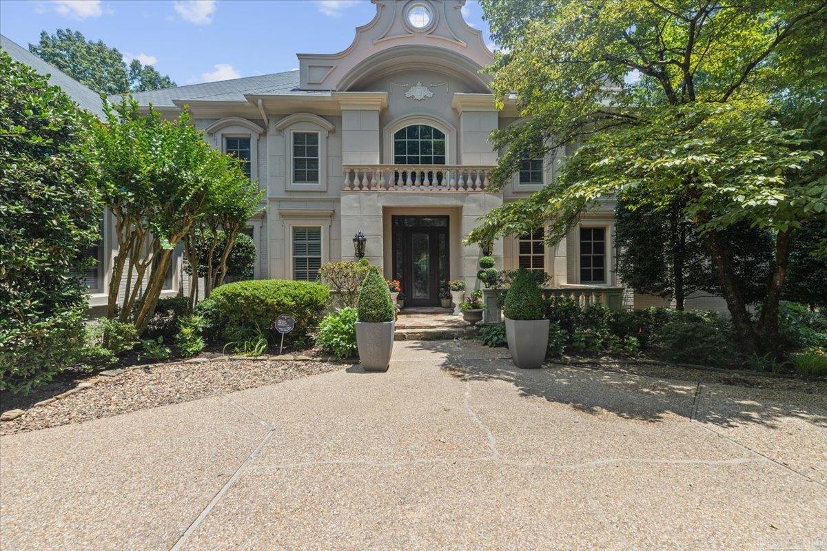 French Chateau located on the 13th hole of the Founder's Golf Course! Extensive exotic landscaping covering this .7 acre lot creates the privacy you crave. Stunning foyer with spiral staircase, wood laden study, theater room, and Dramatic 2 story living room. Generous chefās kitchen opens to spacious hearth room featuring a vaulted ceiling and wetbar. Updated floors, paint and lighting throughout, 4 fireplaces, encapsulated basement, and whole home generator just to name a few of the upgrades.
