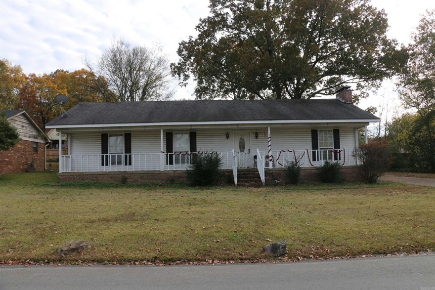 Great location in Bryant close to schools, shopping, dining and commuting! 3 bed/ 2 bath home with spacious backyard that is fully fenced. Full front porch. Open dining and living area with fireplace. Fantastic opportunity for investors. Bryant School District. Priced to sell "As Is".