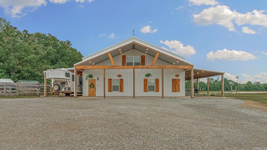 Exceptional country estate just minutes from Jonesboro! This stunning shop-house sits on 38 beautiful acres, ideal for horses, cattle, or recreational use, complete with a pond and wide-open views. The 2,800 sq ft custom home features beautiful finishes throughout, a fireplace, and two spacious living areas perfect for entertaining or multi-generational living. An impressive 1,500 sq ft attached heated and cooled shop offers endless possibilities for a business, hobby space, or additional storage. The land is well-suited for livestock, outdoor enjoyment, and privacy, while still offering convenient access to town. A rare opportunity to own a versatile property combining comfort, functionality, and acreage in a highly desirable location. Must see to appreciate all this property has to offer! Property can be purchased with less acreage.