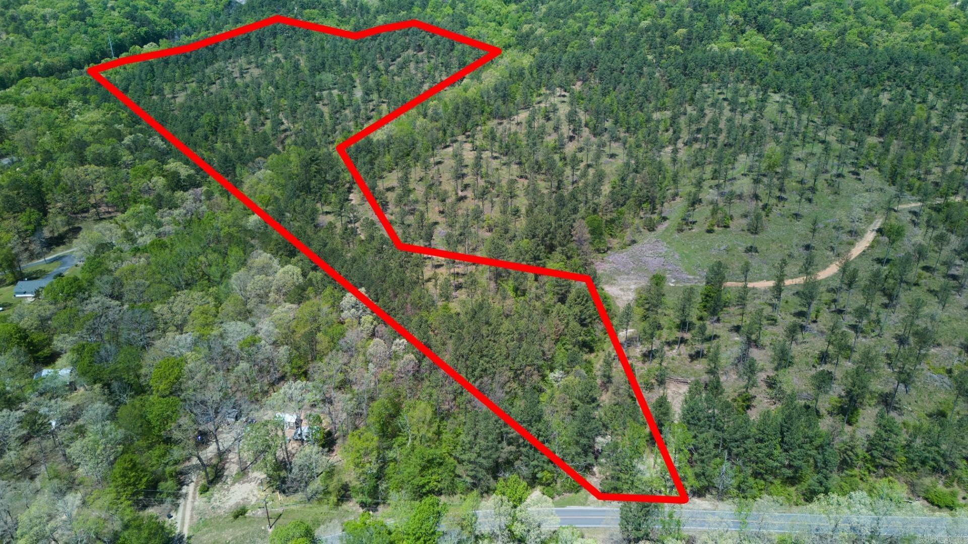 This is one of four parcels that has the potential to be your new home. With approximately 20.3 acres, Tract 4 has plenty of space, scenic rolling hills, and is outside city limits! The property is only 6 minutes from Cutter Morning Star School and 15 minutes from downtown Hot Springs, but it is secluded enough to provide a calm retreat after a long day. These won't last long, so call today to learn more!