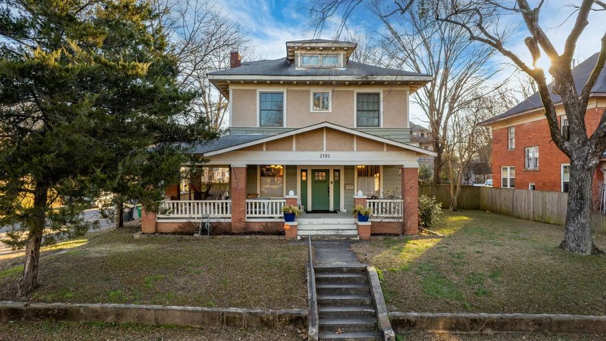 This well-maintained, 4-bedroom, 3 full-bath, and 2 half-bath home is perfectly situated on a corner lot in downtown. Completely remodeled down to the studs in 2014, updates include new electric, gas, and plumbing systems, ensuring modern comfort and efficiency.The inviting front entrance welcomes you into a spacious interior featuring a large primary suite on the main floor, which can also be used as a generous family room. The home boasts ample storage with custom Elfa shelving in all but one closet, providing organization throughout.The finished attic space, equipped with a mini-split system, offers additional flexibility. Outside, a small shop in the backyard is perfect for hobbies or extra storage.