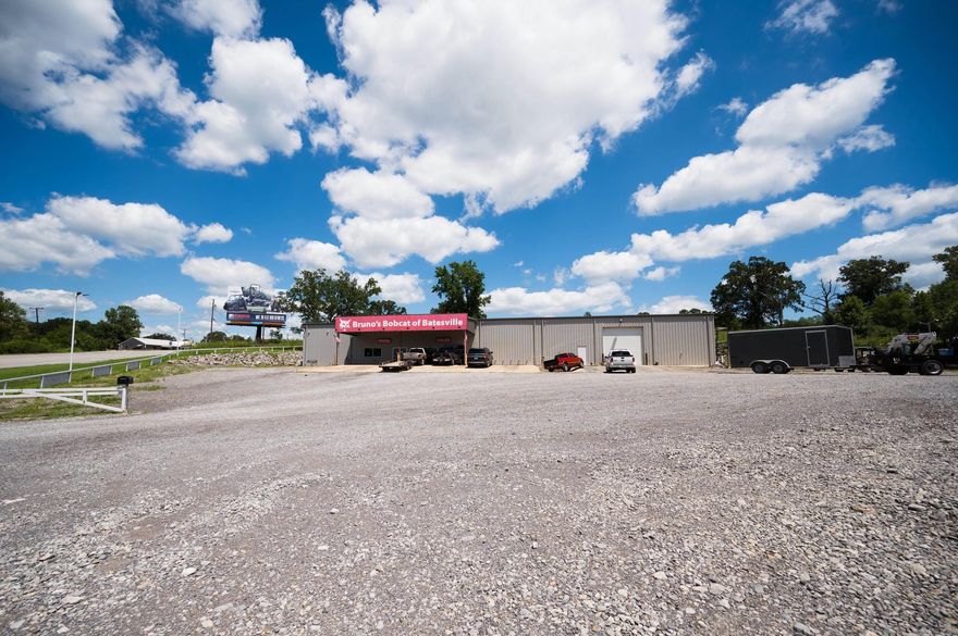 Prime commercial property available at 1525 Batesville Blvd, Batesville, AR! This expansive facility, built in 2018, offers 8,010 sq ft of versatile space suitable for various business needs. Situated on 2.06 acres with highway frontage, it ensures high visibility and easy access. The building features a spacious open interior, ideal for retail, wholesale, office, or professional services. Inside, you'll find a large warehouse with ample storage space, an additional storage room, and an upstairs room perfect for extra office space or inventory. The property is partially fenced with a metal roof, luxury vinyl flooring, and central electric heating and cooling. Ample parking is available for many vehicles. This property offers a prime location for establishing or expanding your business in a thriving area. Don't miss out on this excellent opportunity!