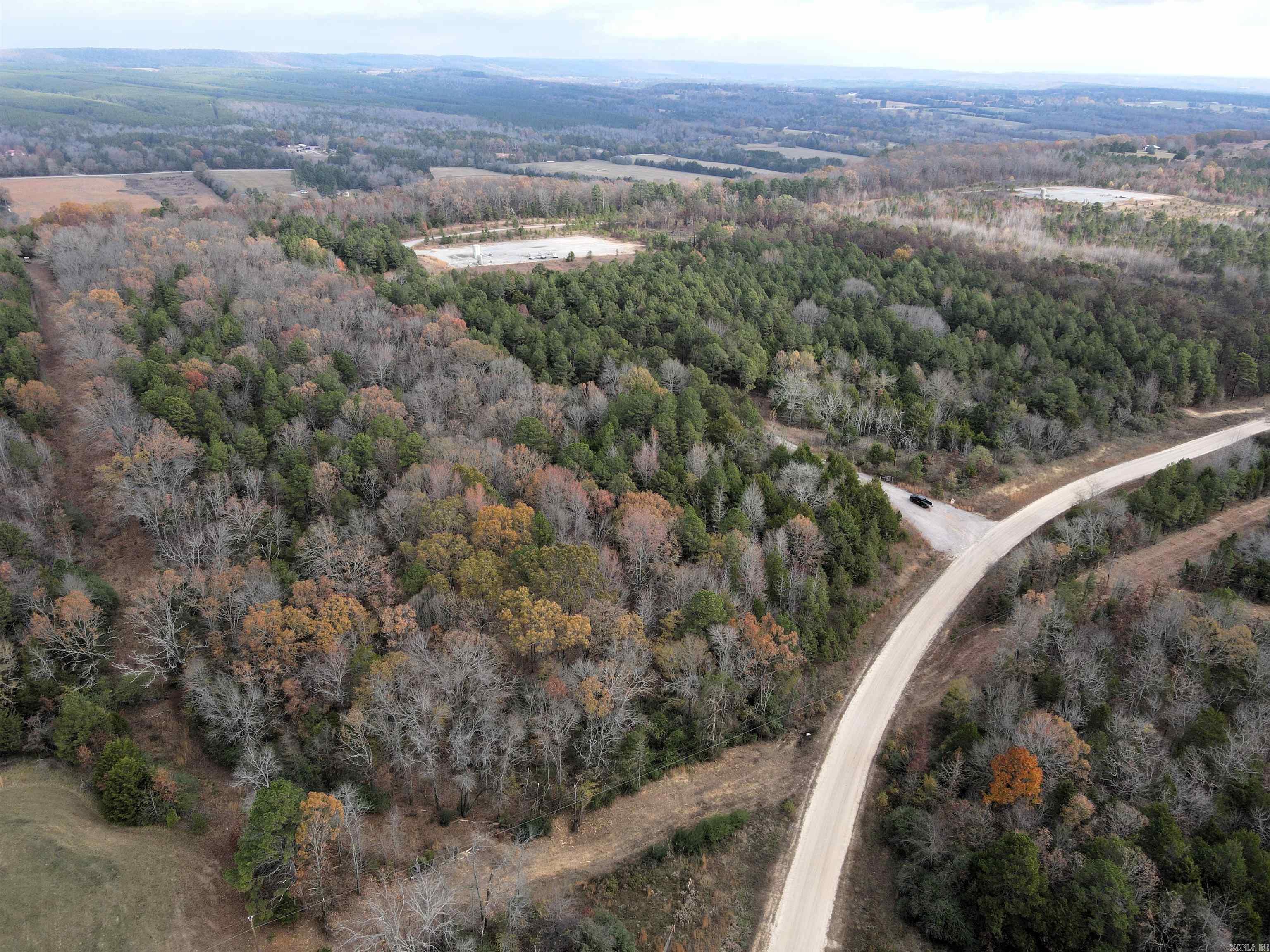 - Numerous build sites - ¼ mile off pavement - Utilities on or near the property - Mature hardwood trees - Healthy deer and small game populations - County road frontage - No restrictions - Outside city limits - 5 miles to Center Ridge - 17 miles to Greenbrier