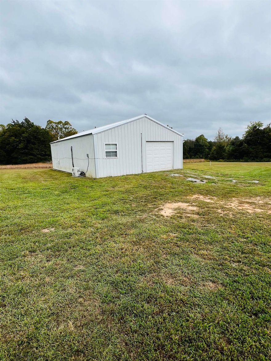 Nestled in the heart of the breathtaking Ozark Mountains, this 1 bedroom, 1 bathroom home on 6.13 acres is your ticket to a life of rustic tranquility.  Key Features: • Cozy 864 square foot barndominium home • A warm and inviting living room • Spacious bedroom for your comfort • A modern bathroom • Open concept living area  • A fully equipped kitchen  • Dedicated washer and dryer room  • A 6.13 acre lot ready for your creative vision  Ozark Living: Immerse yourself in the rich culture and lifestyle of the Ozarks. This property provides you with a unique opportunity to become a part of a community known for its warm hospitality and deep appreciation of the great outdoors. Nearby activities, such as hiking, fishing, and exploring the wilderness await!  Arkansas Charm: Sage, Arkansas embodies the charm and tranquility of small-town living, yet it remains just a short drive away from modern conveniences and necessities, offering the best of both worlds.  Whether you're seeking the chance to construct your dream home and utilize this property as a livable shop, convert it into a rental investment, or use it as a cozy starter home, the possibilities are endless. Listed at $119,900!
