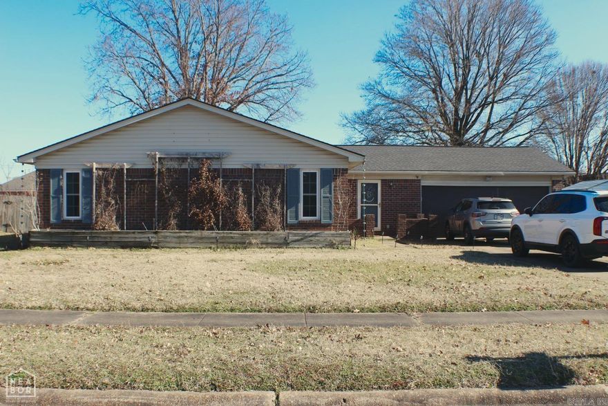 This is the home you've been waiting for! 904 Abbott is nestled in a quite subdivision on the outskirts of Blytheville. The home offers neighbors to socialize with but also a wooden privacy fence in the back yard for days you'd like to just relax on your spacious back patio. Not only is the garage door only a year old but the back door is brand new, widows are 3-4 years old, roof is 6 years old, hot water tank is 5 years old, insulation has been added to the ceiling, and brand new carpet will be laid in the dinning room, living room, and master bedroom in February! Some rooms/ceilings will also be getting a fresh coat of paint along with the wooden accent panels in the entry way to be finished! For days when that Winter chill is just a little to much you can always curl up next to the gas fireplace in the living room or cuddle up in bed in one of the three spacious bedrooms. Your significant other hogging the bathroom? Not a problem with this home! With two full bathrooms each person can have their own space to do as they please! 904 Abbott is ready for new owners so call today to schedule a private showing and lets make this house your new home!